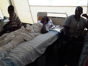 Patient in bed with AS H2O